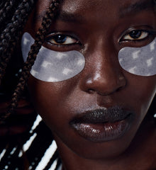 nyawuta wearing r icon eye patches