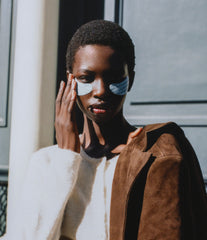 model wearing rhode peptide eye prep