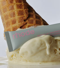 rhode vanilla lip treatment on top of a scoop of vanilla ice cream