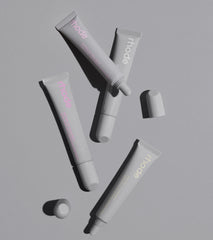 rhode peptide lip treatment in rhode vanilla, unscented, salted caramel, and watermelon slice