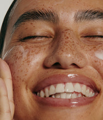 model smiling, applying peptide glazing fluid