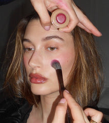 HB wearing plum