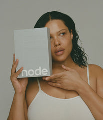 Model holding the rhode kit box