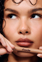 model wearing peptide lip shape in lean