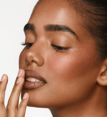 A VOLUMIZING lip shaper for contoured lips.