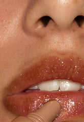model wearing peptide lip tint sweet apple