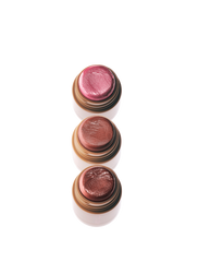 POCKET PEARL A tiny take on our coveted cream blush, reimagined with a shimmery finish.