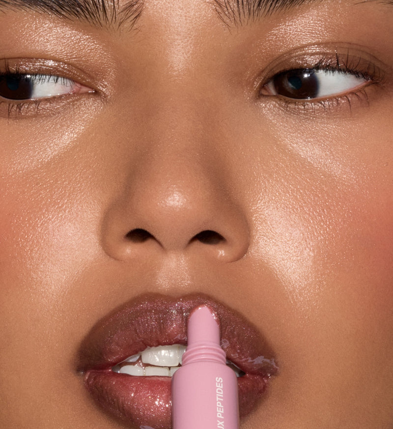 Swipe on Peptide Lip Tint for nourishing hydration and a hint of tint.