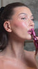 Video of Hailey Bieber applying raspberry jelly lip tint on lips
