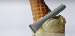 peptide lip treatment in rhode vanilla, on top of a scoop of vanilla ice cream