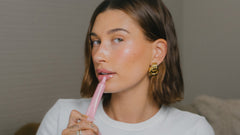 Hailey wears Peptide Lip Tint in shade Ribbon