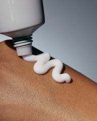 barrier restore cream squeezing onto hand