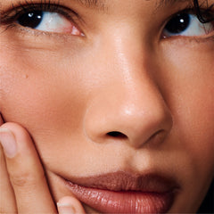 model wears peptide lip shape in stretch